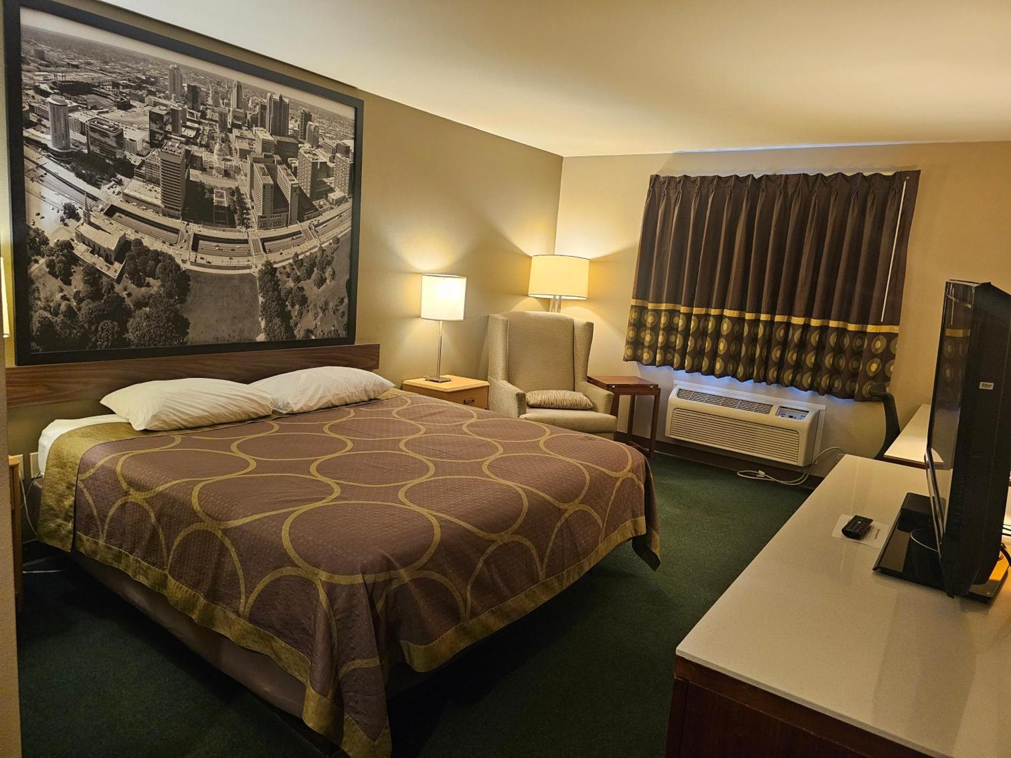 Motel Super 8 By Wyndham Ava Esterno foto