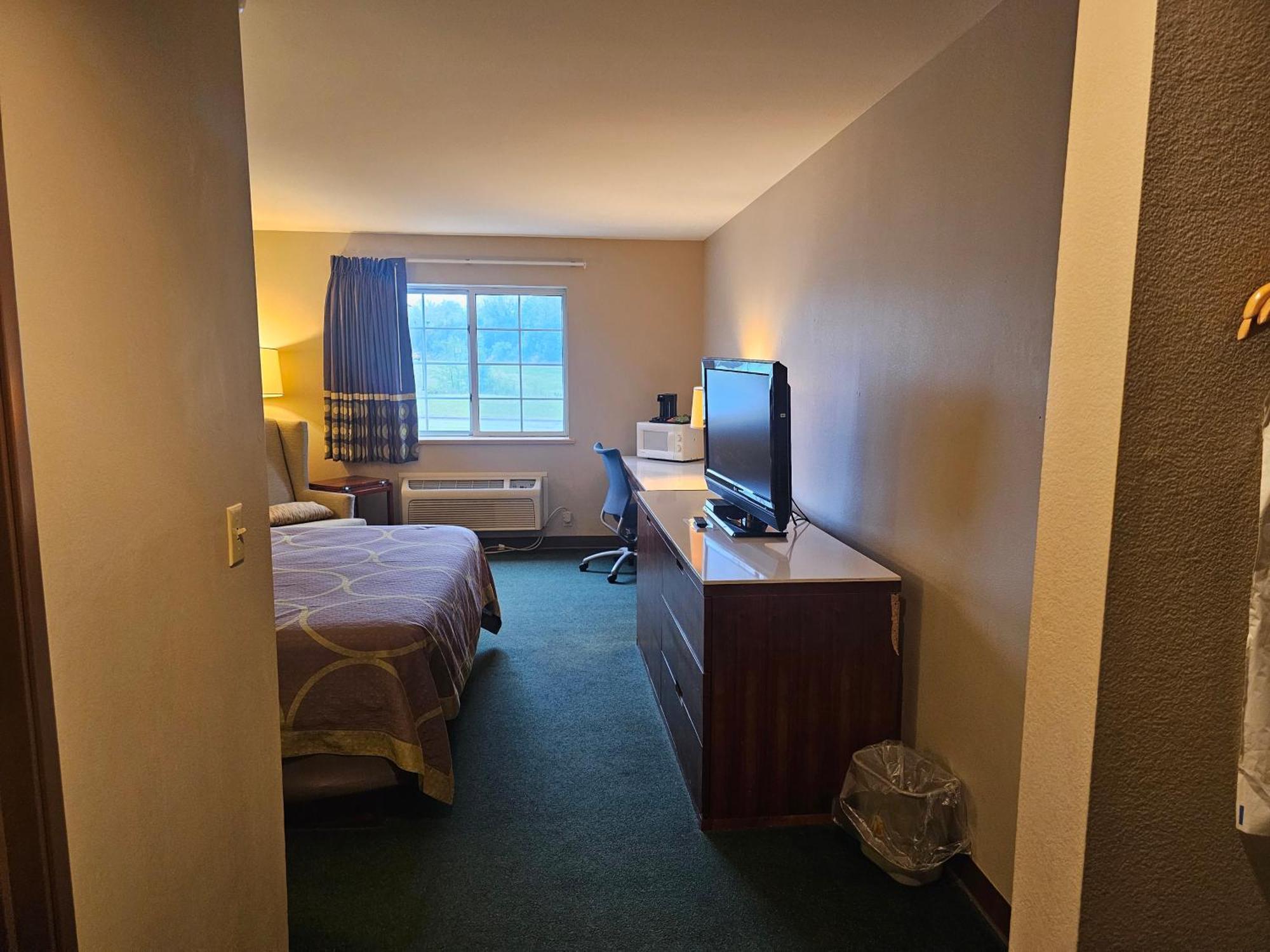 Motel Super 8 By Wyndham Ava Esterno foto