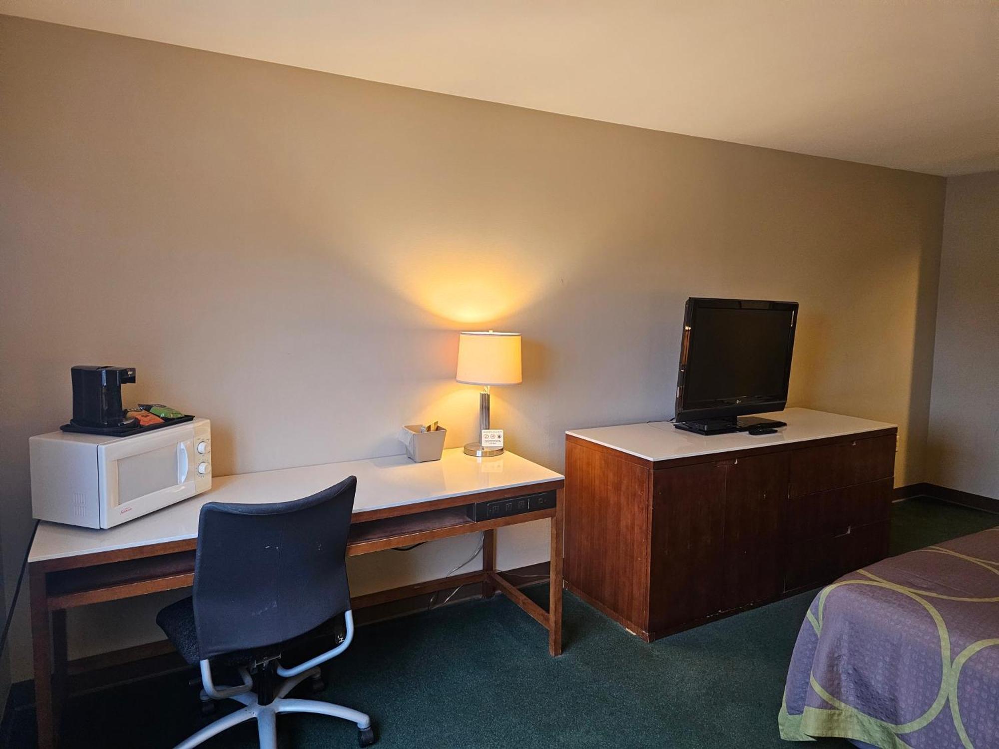 Motel Super 8 By Wyndham Ava Esterno foto