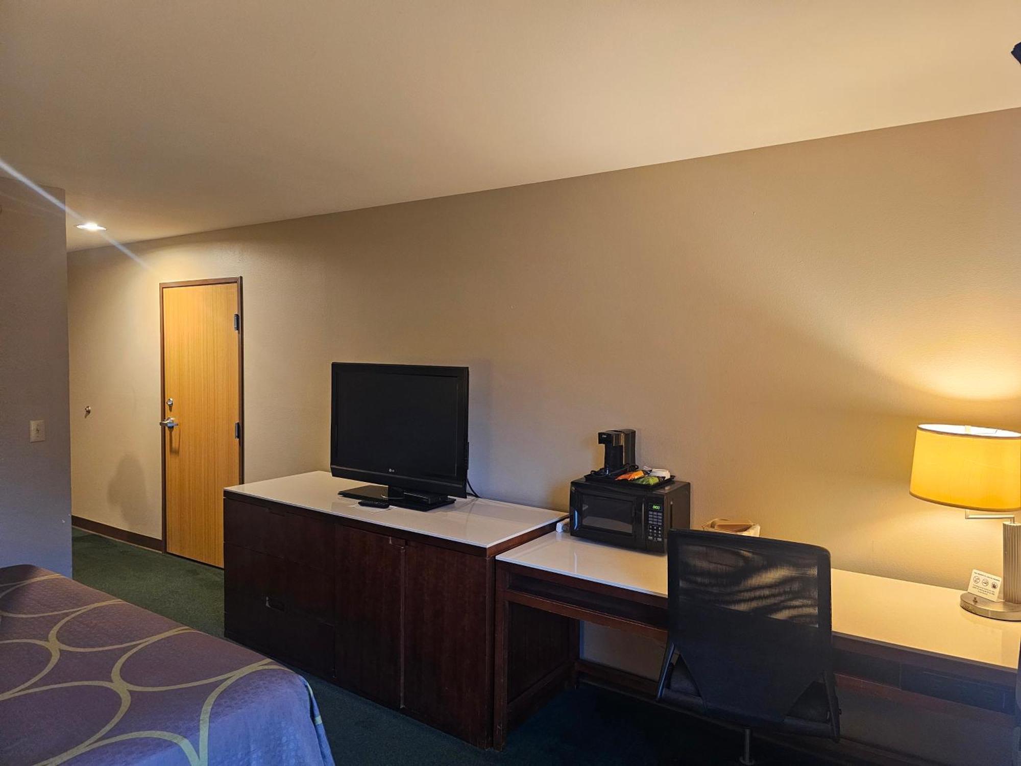 Motel Super 8 By Wyndham Ava Esterno foto