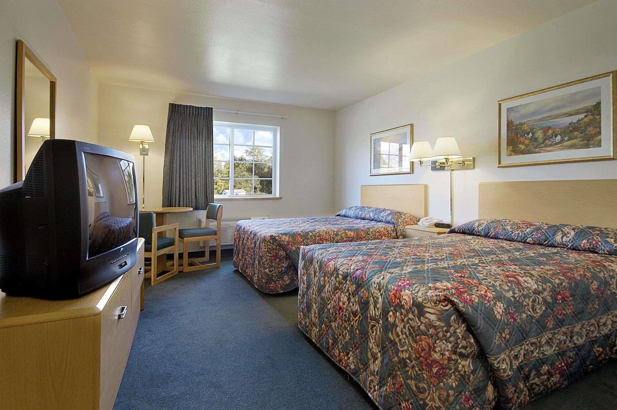 Motel Super 8 By Wyndham Ava Esterno foto